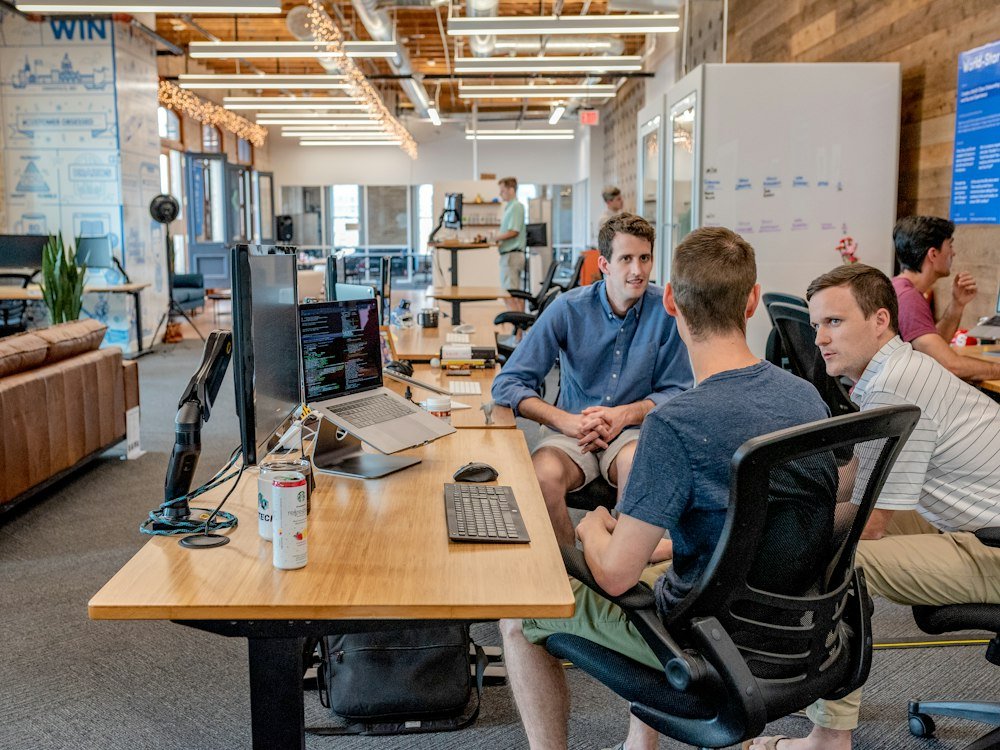 Digital Qrew team meeting in the Houston office
